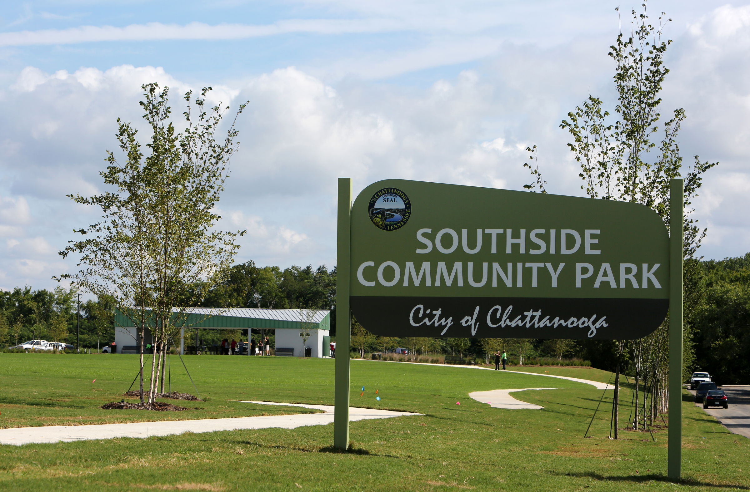 Community members and local politicians held a ribbon cutting event for Southside Community Park Wednesday, Aug. 23, 2017, in Chattanooga, Tenn. The park is located at the site where Charles A. Bell Elementary School was formerly located.