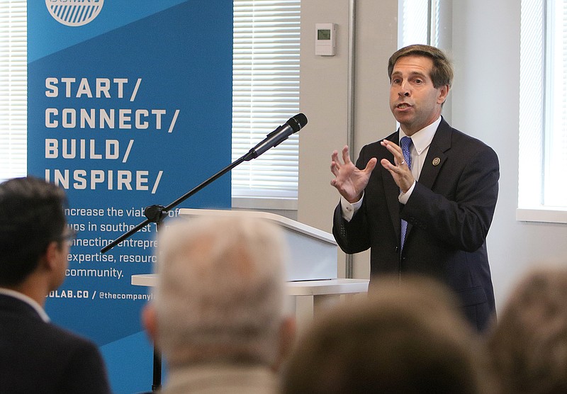 Congressman Chuck Fleischmann speaks to a group of entrepreneurs and others Wednesday, Aug. 23, 2017, before introducing Thomas Zacharia, the Oak Ridge National Laboratory director, during Zacharia's visit to the Innovation District at the Edney Building in Chattanooga, Tenn. Zacharia became the Oak Ridge Lab director July 1.