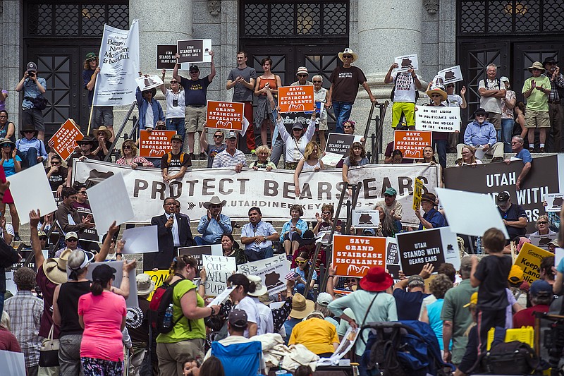 
              FILE - In this May 6, 2017 file photo, hundreds of people gather during the Monumental Rally for Bears Ears and Grand Staircase Monuments at the Utah State Capitol, in Salt Lake City. Conservation groups are airing TV ads, planning rallies and creating parody websites in a last-minute blitz to persuade Interior Secretary Ryan Zinke to refrain from reducing or eliminating large swaths of land across the country that have been designated as national monuments, Tuesday, Aug. 22, 2017. (Chris Detrick/The Salt Lake Tribune via AP, File)
            