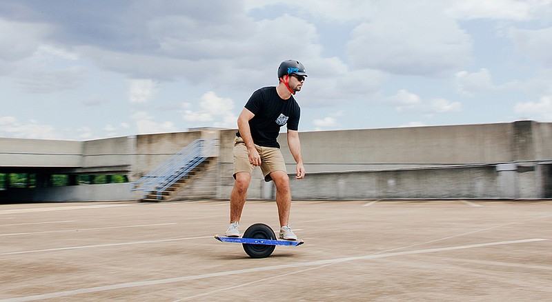 Dirk Unkle of L2 Outside cruises around on the Onewheel in a parking garage in Chattanooga. Unkle says he always wears at least a helmet while he rides, and says people who trail ride with the Onewheel often don additional protective gear, such as shin guards or knee pads. 