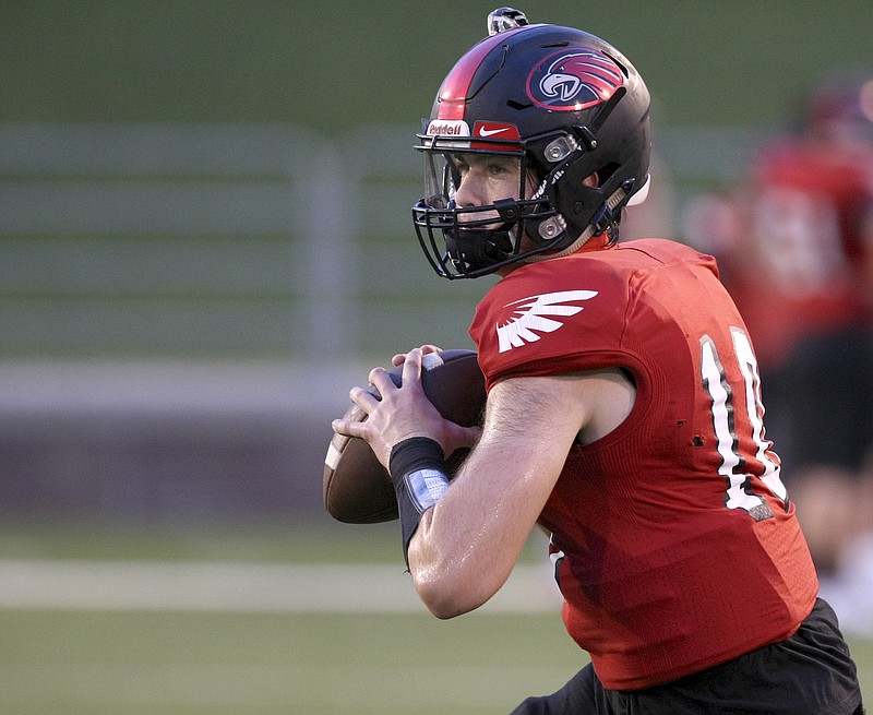 Signal Mountain's Tom Vatter (10) warms up before facing off against Notre Dame during the Kickoff Classic Best of Preps jamboree at Finley Stadium on Friday, Aug. 11, in Chattanooga, Tenn.