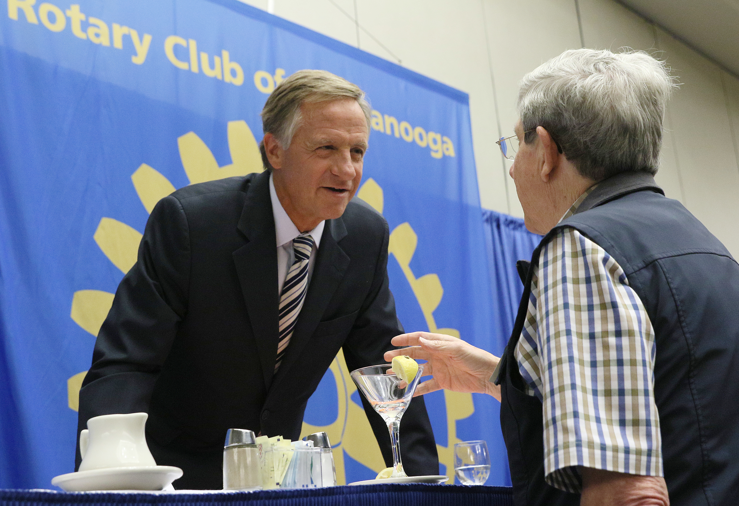 Gov. Bill Haslam speaks with John Murphy, who founded Cleveland Pediatrics, following the Chattanooga Rotary Club meeting Thursday, Aug. 24, 2017, at the Chattanooga Convention Center in Chattanooga, Tenn. Murphy wanted to express his gratitude to Haslam for his work in education and health insurance.