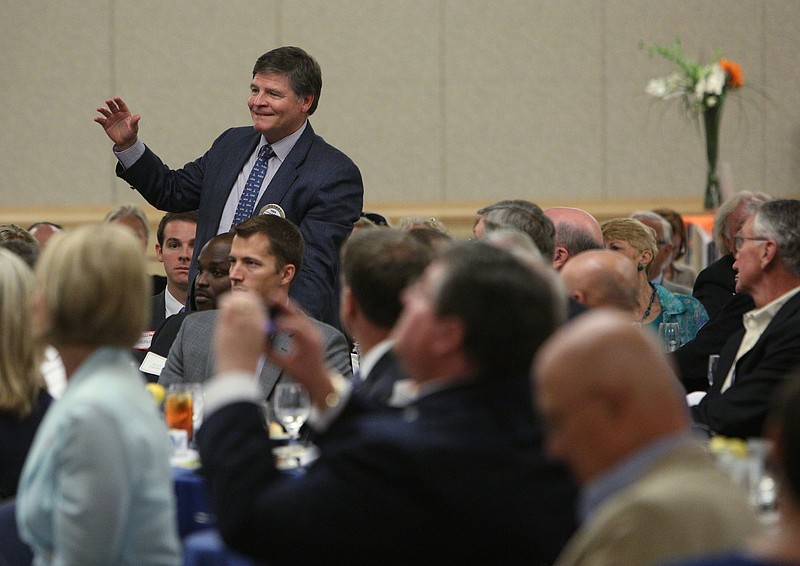 Fred Decosimo asks Gov. Bill Haslam a question about the opioid crisis during the Chattanooga Rotary Club meeting Thursday, Aug. 24, 2017, at the Chattanooga Convention Center in Chattanooga, Tenn. Haslam fielded audience question following his formal speech.