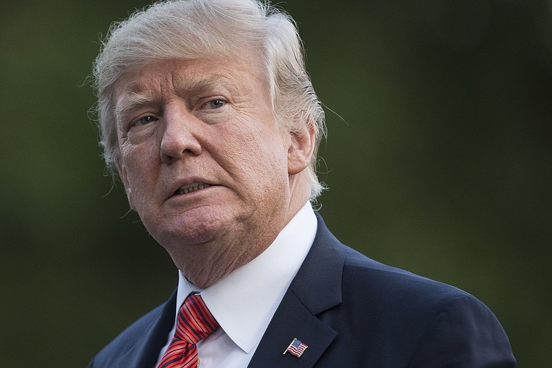 
              FILE - In this Aug. 23, 2017 file photo, President Donald Trump walks on the South Lawn of the White House in Washington. The president lashed out at Republican leaders in Congress, suggesting efforts to increase the country's borrowing limit to avoid an economic-rattling default on the nation's debt are "a mess!" (AP Photo/Carolyn Kaster)
            