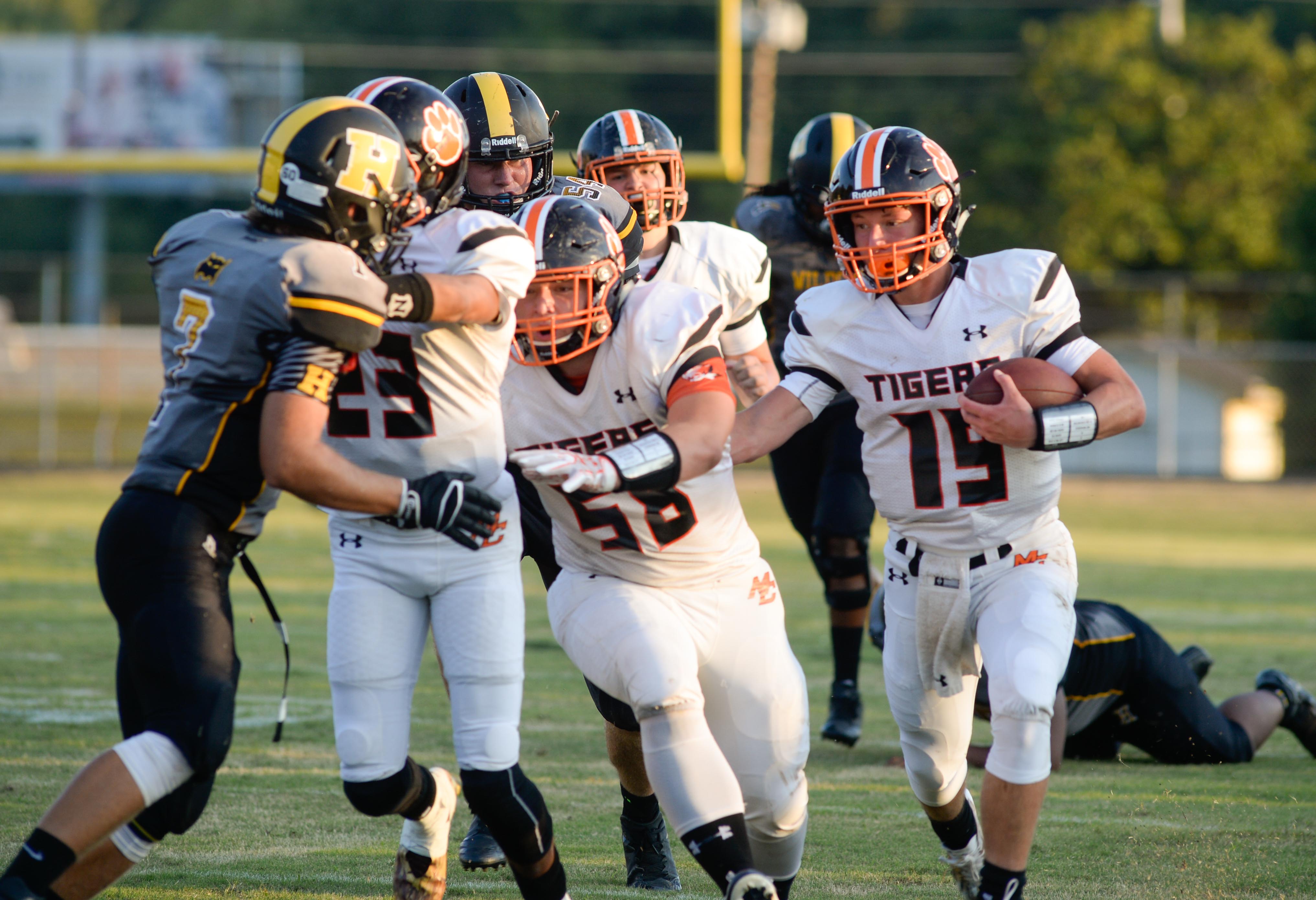 Meigs County Aaron Swafford tries to find a hole during the game against Hixson on Aug. 25, 2017. (Photo by Mark Gilliland)