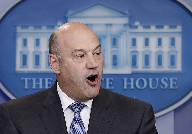 
              In this April 26, 2017 photo, National Economic Director Gary Cohn speaks in the briefing room of the White House, in Washington.  Cohn says he's under "enormous pressure" both to quit and remain in the White House and says the administration "must do better" in condemning hate groups after the violence at a white nationalist rally in Charlottesville, Virginia.  (AP Photo/Carolyn Kaster)
            