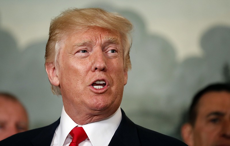 
              In this photo taken Aug. 14, 2017, President Donald Trump speaks in the Diplomatic Reception Room of the White House in Washington. Donald Trump came into office as the most unpopular new president in the history of modern polling. Things have not improved. (AP Photo/Alex Brandon)
            