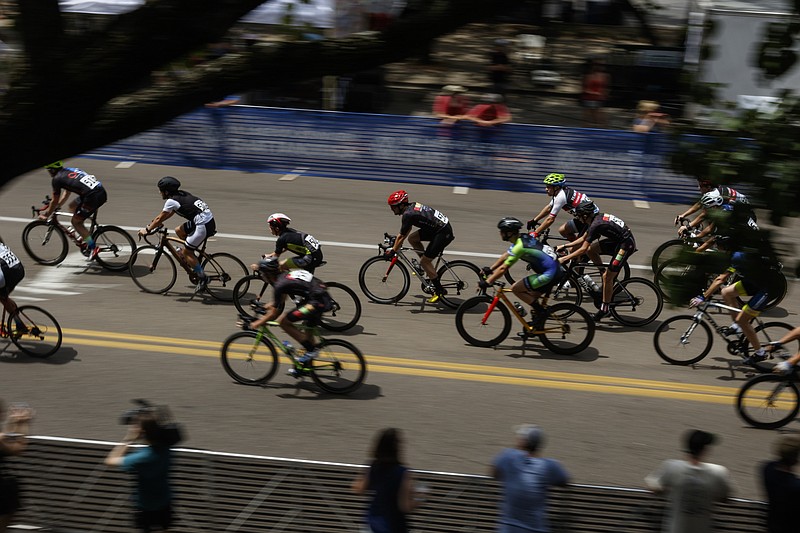 Cyclists compete in the Men's Cat 5 Criterium race of the River Gorge Omnium cycling competition on Saturday, Aug. 26, 2017, in Chattanooga, Tenn. The three-days of races began with time trials on Friday and criterium races on Saturday, and it concludes with road races on Sunday.