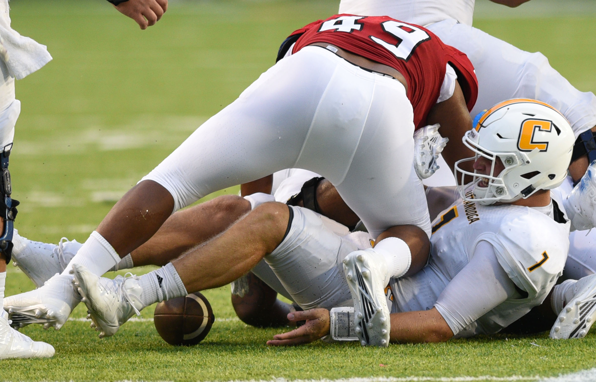 UTC quarterback Nick Tiano (7) can't reach a Moc fumble. Jacksonville recovered the ball. The University of Chattanooga Mocs met the Jacksonville State Gamecocks in the Guardian Credit Union FCS Kickoff at the Carmton Bowl in Montgomery, Alabama on August 26, 2017.