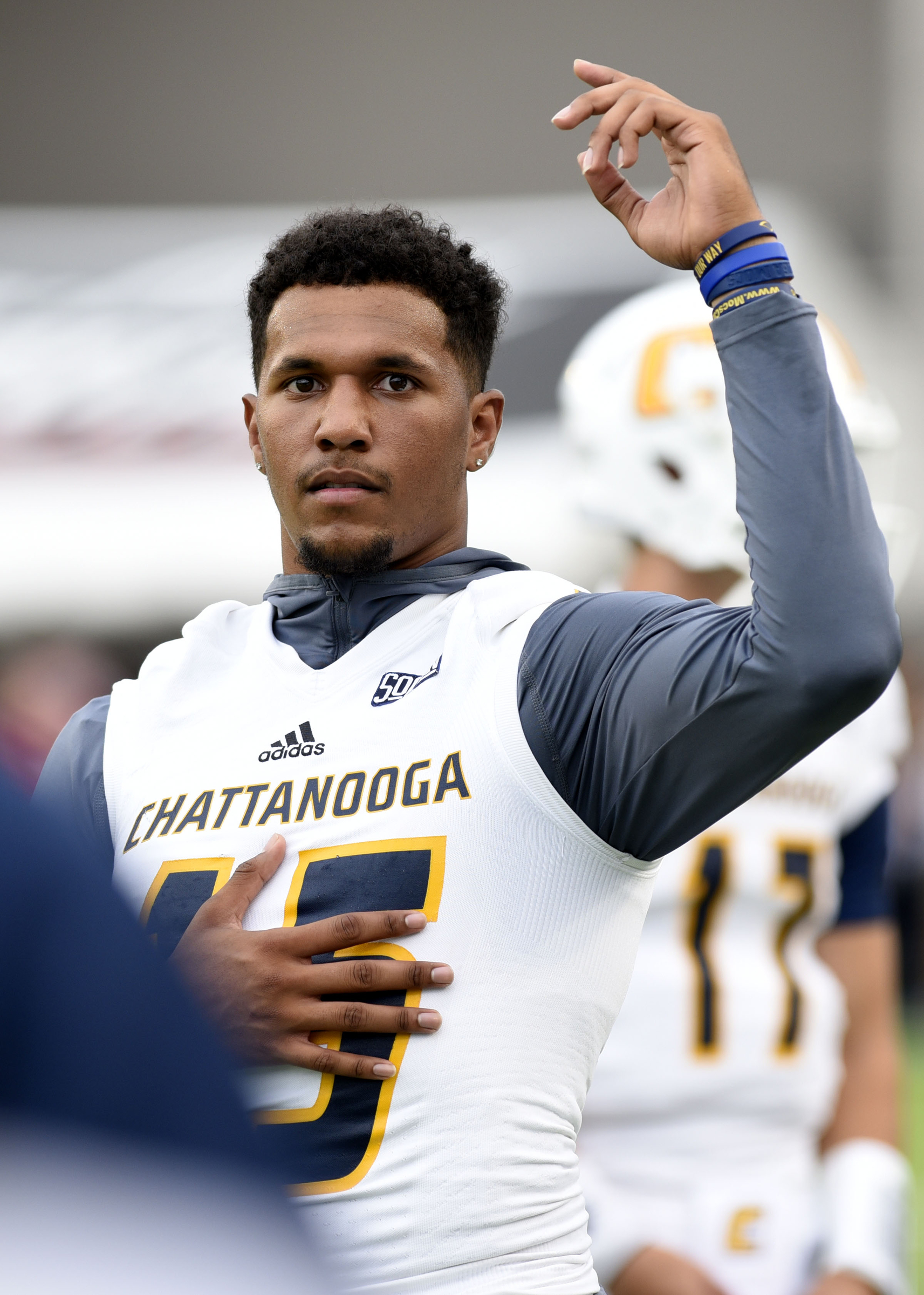 Sidelined quarterback Alejandro Bennifield (15) urges the crowd to cheer for the Mocs. The University of Chattanooga Mocs met the Jacksonville State Gamecocks in the Guardian Credit Union FCS Kickoff at the Carmton Bowl in Montgomery, Alabama on August 26, 2017.