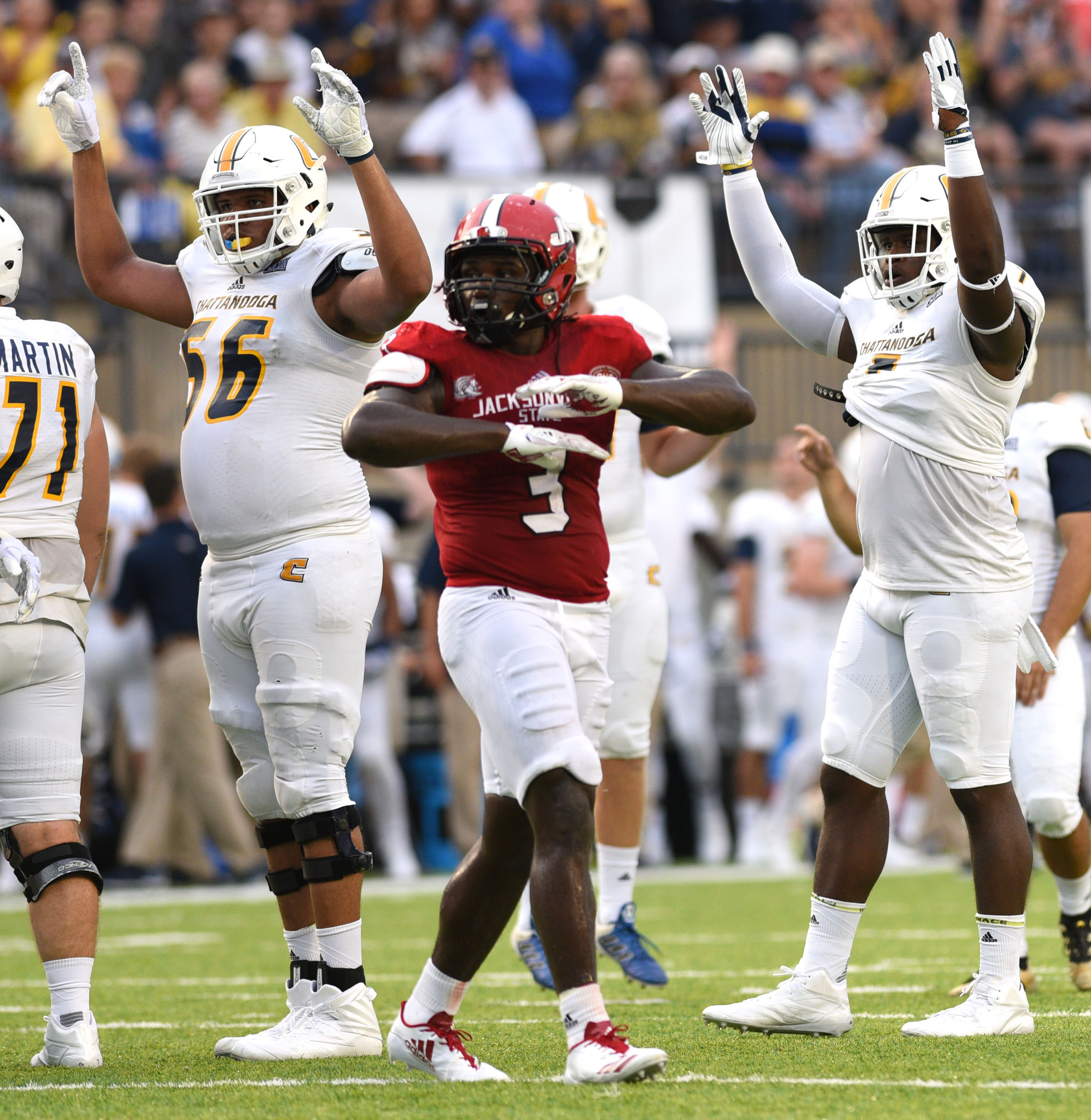 UTC's Malcom White (56) and Derek Mahaffey (5) signal that Victor Ulmo's field goal is good. The University of Chattanooga Mocs met the Jacksonville State Gamecocks in the Guardian Credit Union FCS Kickoff at the Carmton Bowl in Montgomery, Alabama on August 26, 2017.