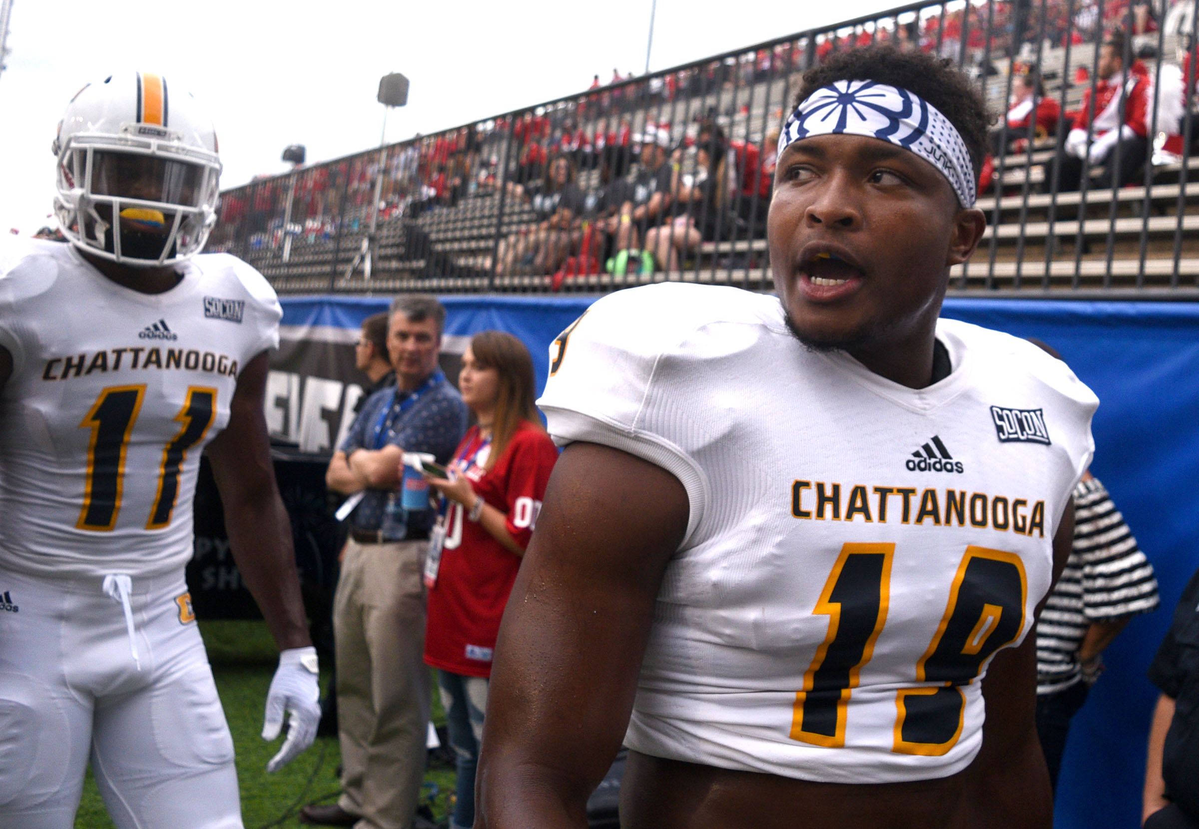 Tee Davis (19) answers the taunts of Gamecock players as the two teams come off the field after warm ups. The University of Chattanooga Mocs met the Jacksonville State Gamecocks in the Guardian Credit Union FCS Kickoff at the Carmton Bowl in Montgomery, Alabama on August 26, 2017.
