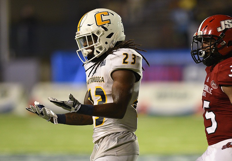 UTC's Richardre Bagley looks at his hands after dropping passes on consecutive plays in Saturday's loss to Jacksonville State.