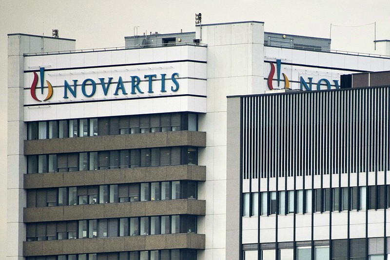 
              FILE - This Oct. 25, 2011 file photo shows the logo of Swiss pharmaceutical company Novartis AG on one of their buildings in Basel, Switzerland. According to results published Sunday, Aug. 27, 2017, for the first time, a drug has helped prevent heart attacks by curbing inflammation, a new and very different approach than lowering cholesterol, which has been the main focus for decades. Canakinumab's maker, Novartis, sponsored the study. (Georgios Kefalas/Keystone via AP, File)
            