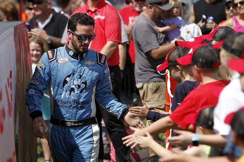 Jeremy Clements is seen during drivers introductions for the NASCAR Xfinity Series auto race, Saturday, Aug. 12, 2017, at Mid Ohio Sports Car Course in Lexington, OH. (AP Photo/Tom E. Puskar)