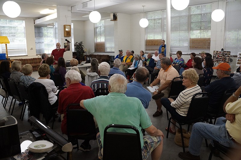 Councilman Dan Landrum speaks to residents in the Mountain Arts Community Center during one of the monthly community forum meetings he moderates. August's meeting was focused on brainstorming ideas to save the MACC. (Staff photo by Myron Madden)