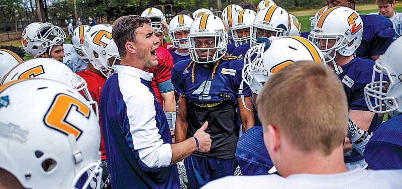 UTC head football coach Tom Arth directs players during UTC’s spring football game day earlier this year. This year’s spring game was an open practice followed by a 40-minute scrimmage.