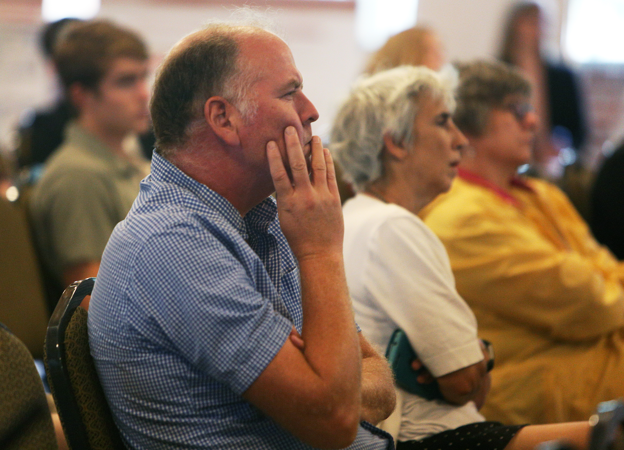 Graham Truelove listens to a presentation from Nelson/Nygaard Consulting Associates on a parking study performed on the downtown Chattanooga are Monday, Aug. 28, 2017, at the Bessie Smith Cultural Center in Chattanooga, Tenn. Community members were able to check out the parking study that was performed by Nelson/Nygaard Consulting Associates and give feedback.