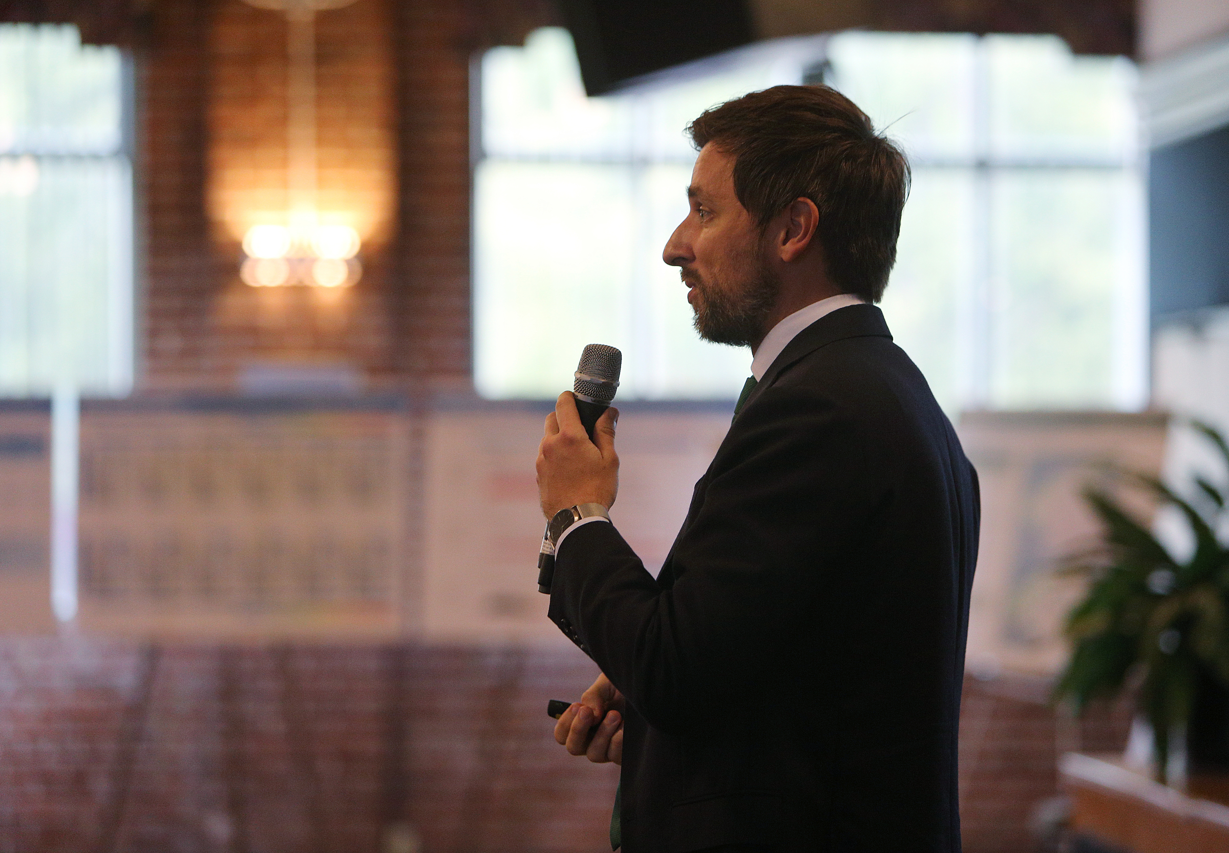 Joel Mann, a senior associate with Nelson/Nygaard Consulting Associates, speaks Monday, Aug. 28, 2017, at the Bessie Smith Cultural Center in Chattanooga, Tenn. The parking study was performed to determine if more parking spaces are needed in the downtown area and how to make the best use of the current parking spaces provided.
