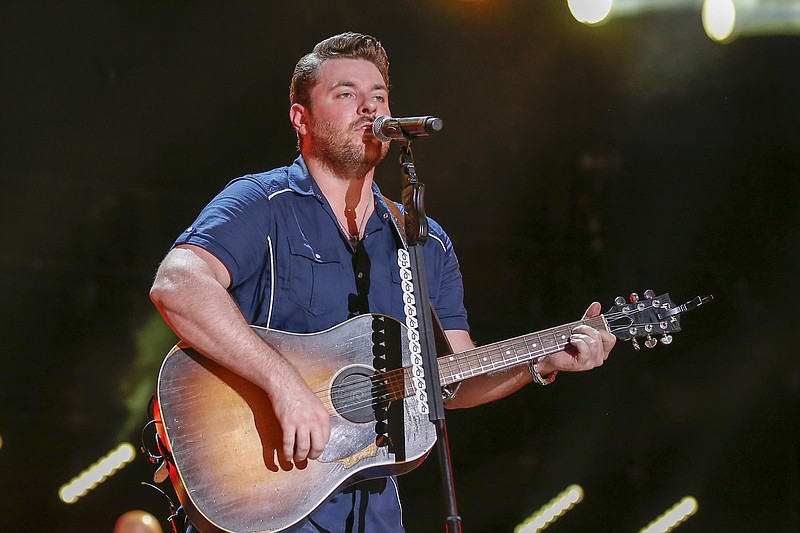 
              FILE - In this Saturday, June 11, 2016, file photo, Chris Young performs at the CMA Music Festival at Nissan Stadium in Nashville, Tenn. Young is donating $100,000 for disaster relief efforts in Texas. Nashville-based Monarch Publicity said in a news release that Young lived in Arlington, Texas, before signing with RCA records and has family and close friends in Hurricane Harvey's path. (Photo by Al Wagner/Invision/AP, File)
            
