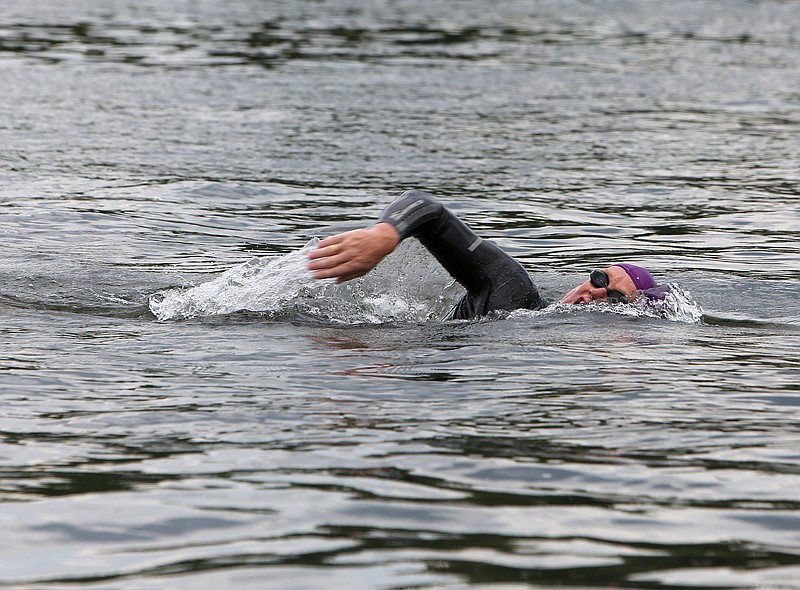 Andreas Fath, a world-record-holding endurance swimmer and professor of Medical and Life Sciences at Furtwangen University in Germany, swims into Chattanooga, Tenn., Friday, Aug. 4, 2017, on the Tennessee River. Fath was collecting data as he swam on the Tennessee River.