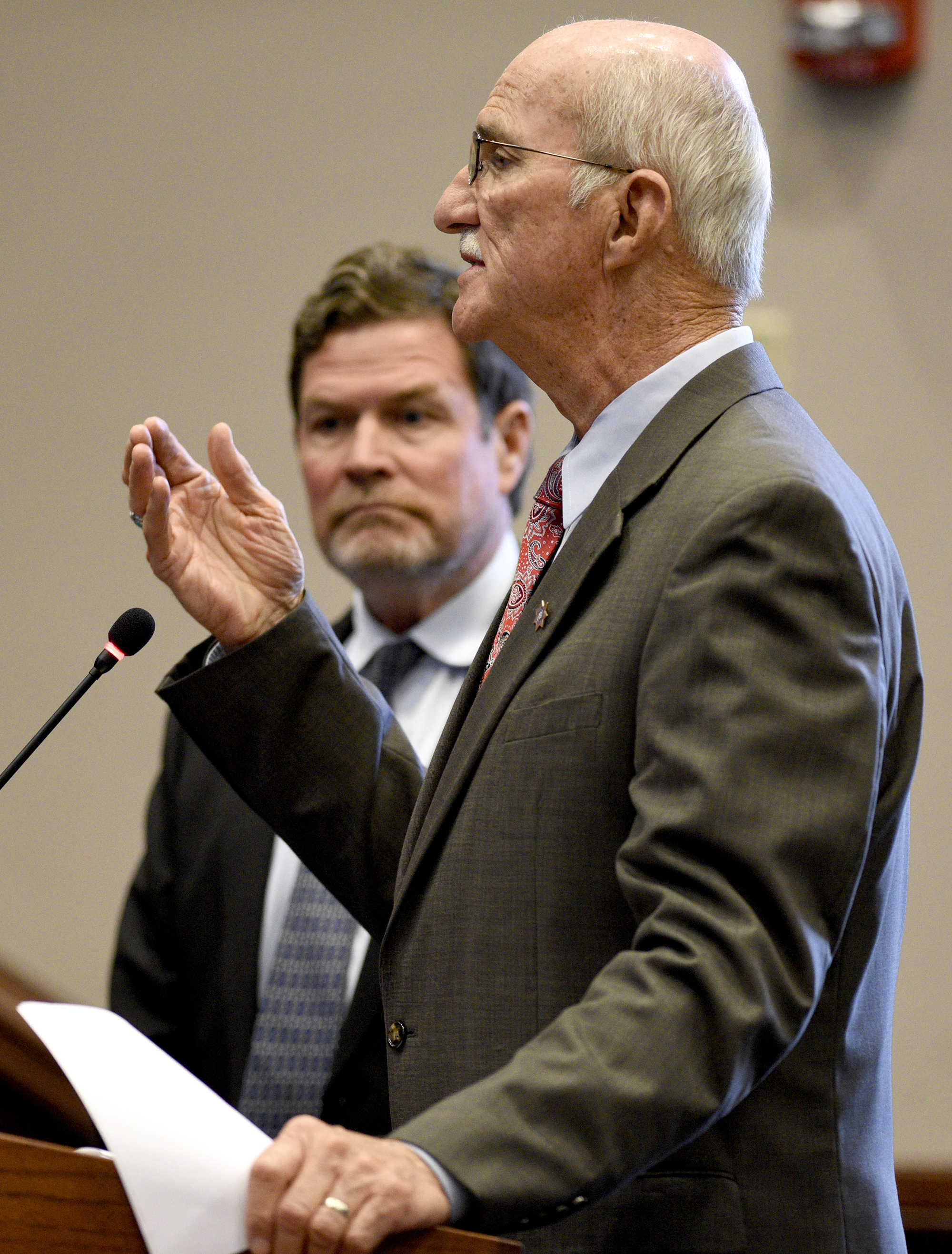 Hamilton County Sheriff Jim Hammond answers questions from the commission. Listening in the background is Tom Morsch Managing Director of PFM Financial Advisors LLC. The Hamilton County Commission listened to a presentation and recommendations for short and long-term jail and workhouse overcrowding at the Wednesday meeting in the Hamilton County Courthouse on August 29, 2017.