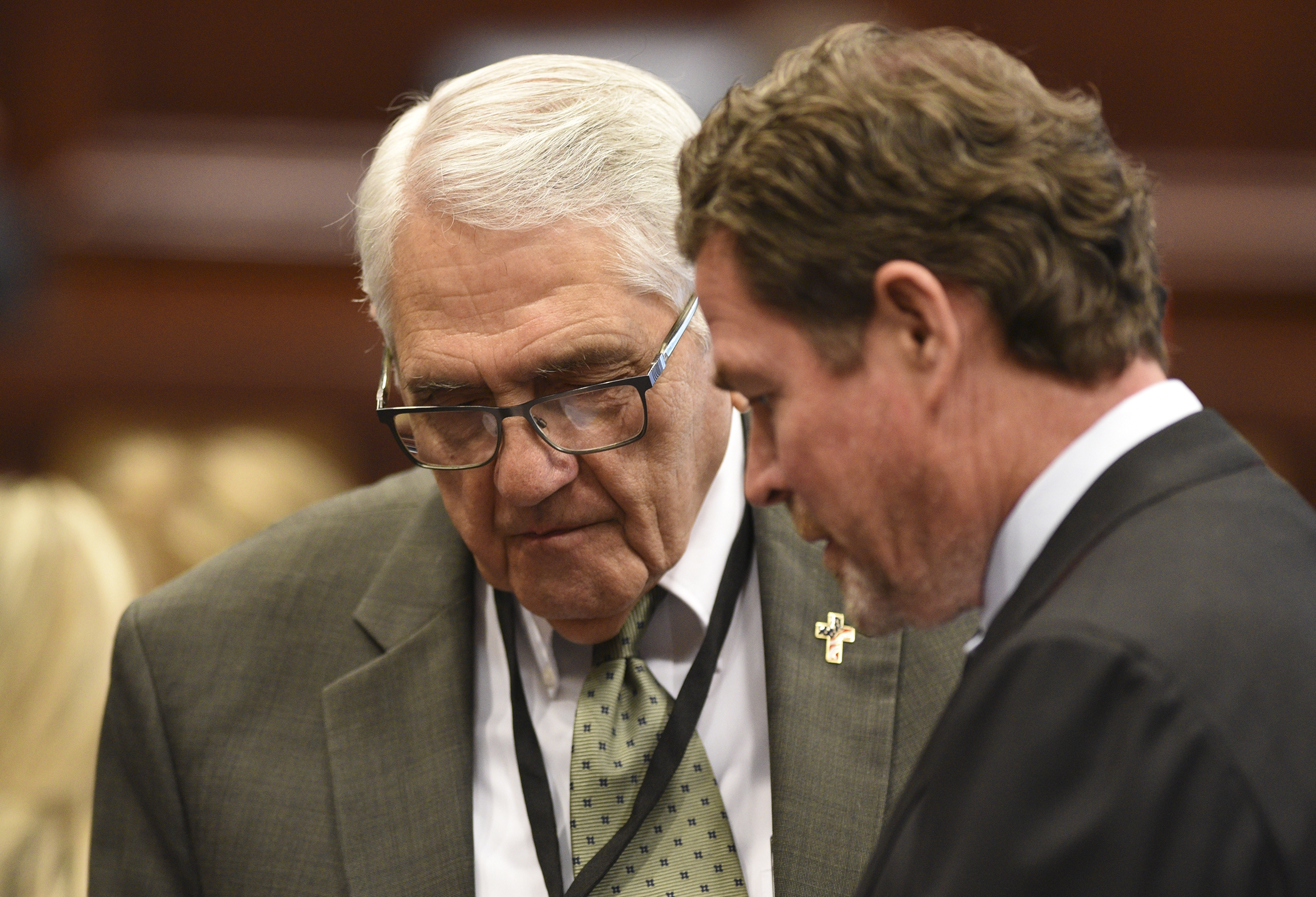 Tom Morsch Managing Director of PFM Financial Advisors LLC, right speaks to Hamilton County Clerk Bill Knowles. The Hamilton County Commission listened to a presentation and recommendations for short and long-term jail and workhouse overcrowding at the Wednesday meeting in the Hamilton County Courthouse on August 29, 2017.