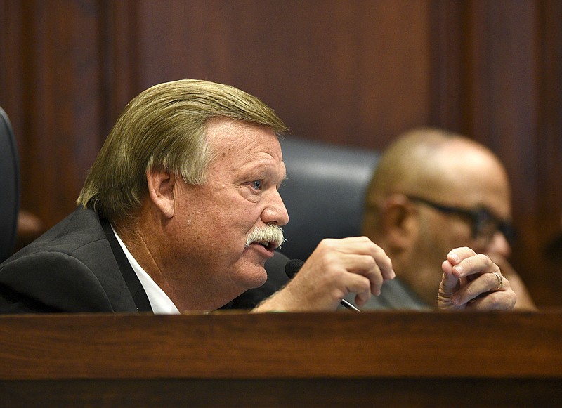 County Mayor Jim Coppinger comments during the meeting.  Listening in the background is County Attorney Rheubin Taylor.  The Hamilton County Commission listened to a presentation and recommendations for short and long-term jail and workhouse overcrowding at the Wednesday meeting in the Hamilton County Courthouse on August 29, 2017.