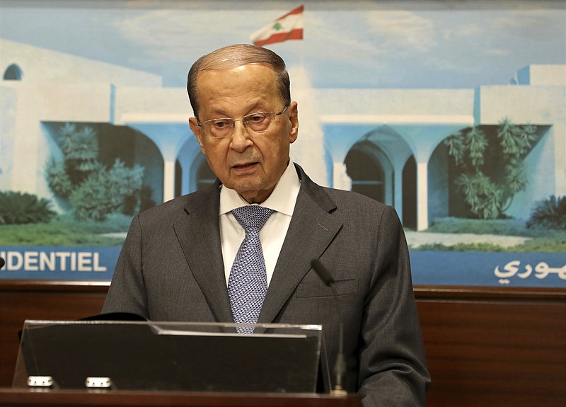 
              In this photo released by Lebanon's official government photographer Dalati Nohra, Lebanese President Michel Aoun, speaks to journalists at the Presidential Palace in Baabda, east of Beirut, Lebanon, Wednesday, Aug. 30, 2017. Aoun declared victory against the Islamic State group Wednesday in a live statement praising the Lebanese army for carrying out the operation that ended with the deal to evacuate IS fighters and their families in return for information about nine troops who were kidnapped by IS in August 2014. (Dalati Nohra via AP)
            
