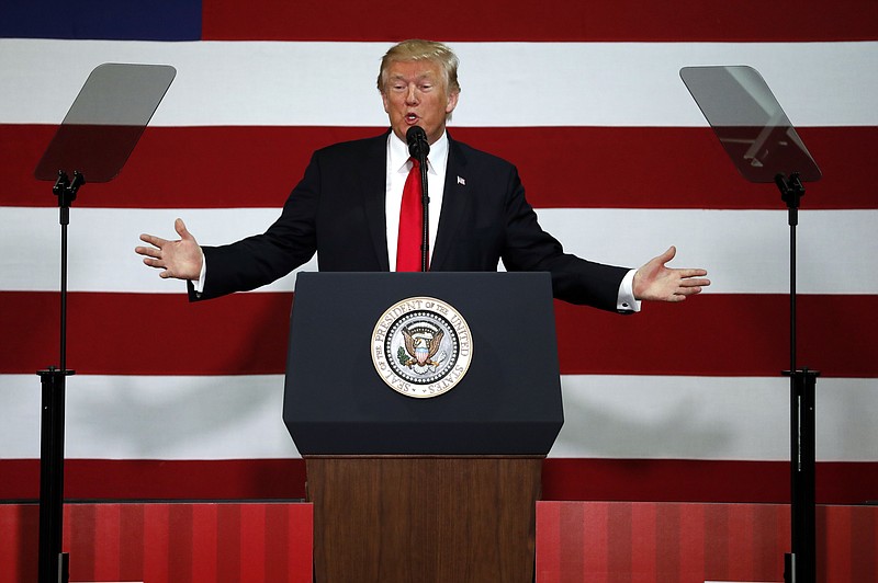 President Donald Trump speaks about tax reform, Wednesday, Aug. 30, 2017, at the Loren Cook Company in Springfield, Mo. (AP Photo/Jeff Roberson)