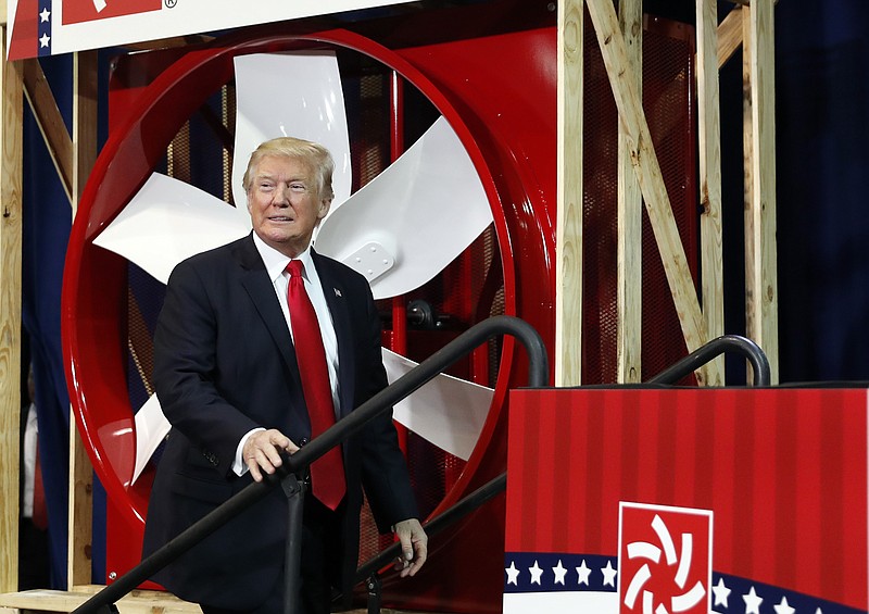 President Donald Trump arrives to speak about tax reform, Wednesday, Aug. 30, 2017, at the Loren Cook Company in Springfield, Mo. (AP Photo/Alex Brandon)