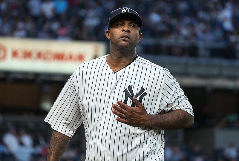 
              New York Yankees pitcher C. C. Sabathia walks to the dugout after striking out a Boston Red Sox batter to end the top of the first inning of a baseball game Thursday, Aug. 31, 2017, in New York. (AP Photo/Craig Ruttle)
            
