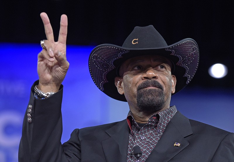 In this Feb. 23, 2017, file photo, Milwaukee County Sheriff David Clarke speaks at the Conservative Political Action Conference (CPAC) in Oxon Hill, Md. Clarke, a conservative firebrand and enthusiastic supporter of President Donald Trump, has resigned. In a brief statement Thursday, Aug. 31, 2017 Clarke didn't say why he was leaving more than a year before his term ends, but said he would announce news soon. (AP Photo/Susan Walsh File)