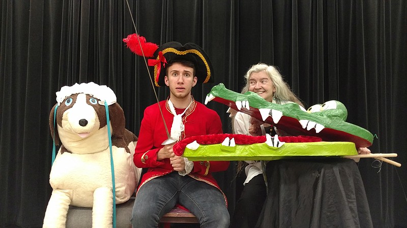 Skwalking Heads Productions assistant director Noah Huseman, as "Captain Hook," appears concerned with the approaching crocodile puppet held by director Colleen Laliberte as the Nana puppet looks on. Skwalking Heads' Acting for Kids classes, which will present "Disney's Peter Pan JR." in December, begin Tuesday, Sept. 12 at Bachman Community Center. (Contributed photo)