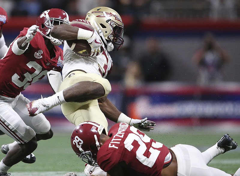 Florida State freshman running back Cam Akers found the running difficult Saturday night against Minkah Fitzpatrick and the Alabama defense.