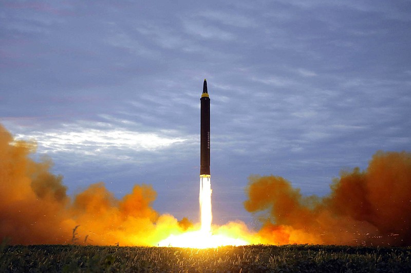 
              FILE - This Aug. 29, 2017 file photo distributed on Aug. 30, 2017, by the North Korean government shows what was said to be the test launch of a Hwasong-12 intermediate range missile in Pyongyang, North Korea. 
Japan is debating whether to develop limited pre-emptive strike capability and buy cruise missiles - ideas that were anathema in the pacifist country before the North Korea missile threat.  North Korea’s test-firing of a missile on Aug. 29, 2017, which flew over Japan and landed in the northern Pacific Ocean, quickly reactivated the debate at parliament and in the media. (Korean Central News Agency/Korea News Service via AP, File)
            