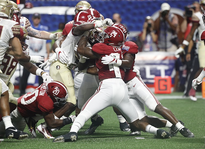 Led by the efforts of linebackers Shaun Dion Hamilton (20), Terrell Lewis (24), Rashaan Evans (32) and other Alabama defenders, the Crimson Tide held Florida State to just 40 rushing yards Saturday night. Lewis reportedly tore a ligament in his elbow and is out for the season.