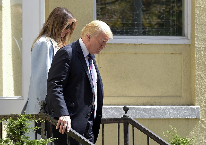 
              President Donald Trump and first lady Melania Trump leave after attending services at St. John's Church in Washington, Sunday, Sept. 3, 2017. The president last week named today a National Day of Prayer for victims of Hurricane Harvey. (AP Photo/Susan Walsh)
            