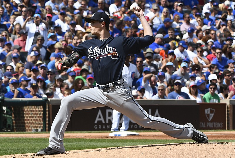 Atlanta Braves starting pitcher Max Fried (61) delivers during the first inning of a baseball game against the Chicago Cubs on Sunday, Sept. 3, 2017, in Chicago. (AP Photo/Matt Marton)