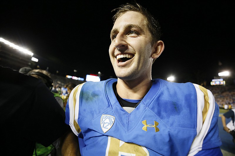 
              UCLA quarterback Josh Rosen leaves the field after defeating Texas A&M in an NCAA college football game, Sunday, Sept. 3, 2017, in Pasadena, Calif. UCLA won 45-44. (AP Photo/Danny Moloshok)
            