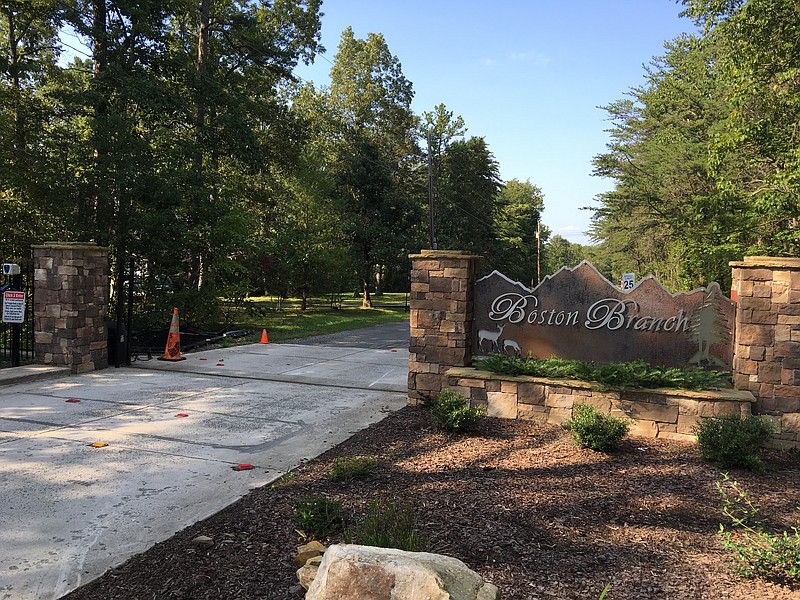 The entry gate, now smashed, at Boston Branch on Signal Mountain.