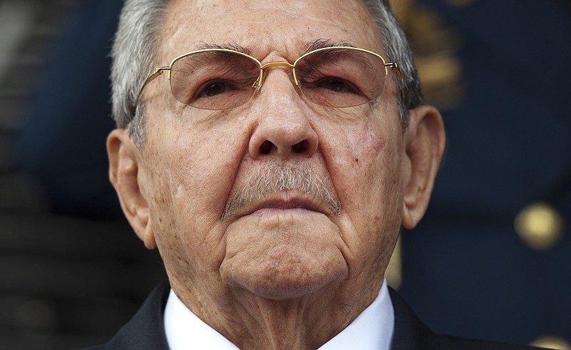 
              FILE - In this March 17, 2015 file photo, Cuba's President Raul Castro listens to the playing of national hymns during his welcoming ceremony at Miraflores presidential palace before the start of an emergency ALBA meeting in Caracas, Venezuela. Cuba will begin on Monday, Sept. 4, 2017 an electoral process that will presumably conclude with the departure of Castro from the presidency. (AP Photo/Ariana Cubillos, File)
            