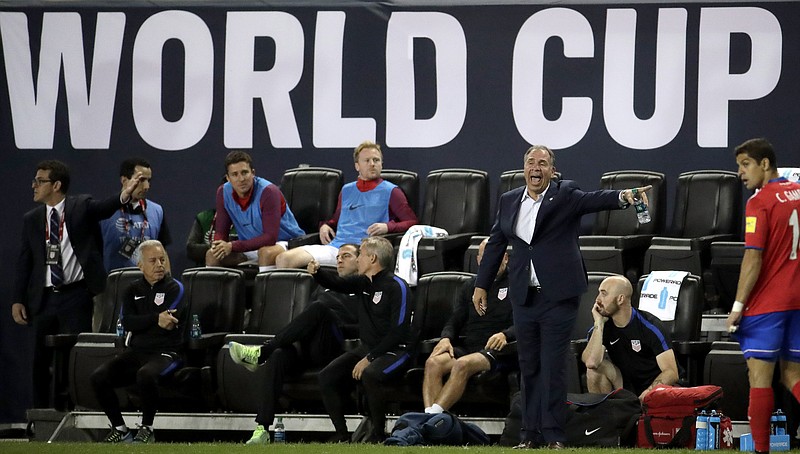 
              U.S. coach Bruce Arena, center right, shouts during the second half of the teams' World Cup qualifying soccer match against Costa Rica, Friday, Sept. 1, 2017, in Harrison, N.J. (AP Photo/Julio Cortez)
            