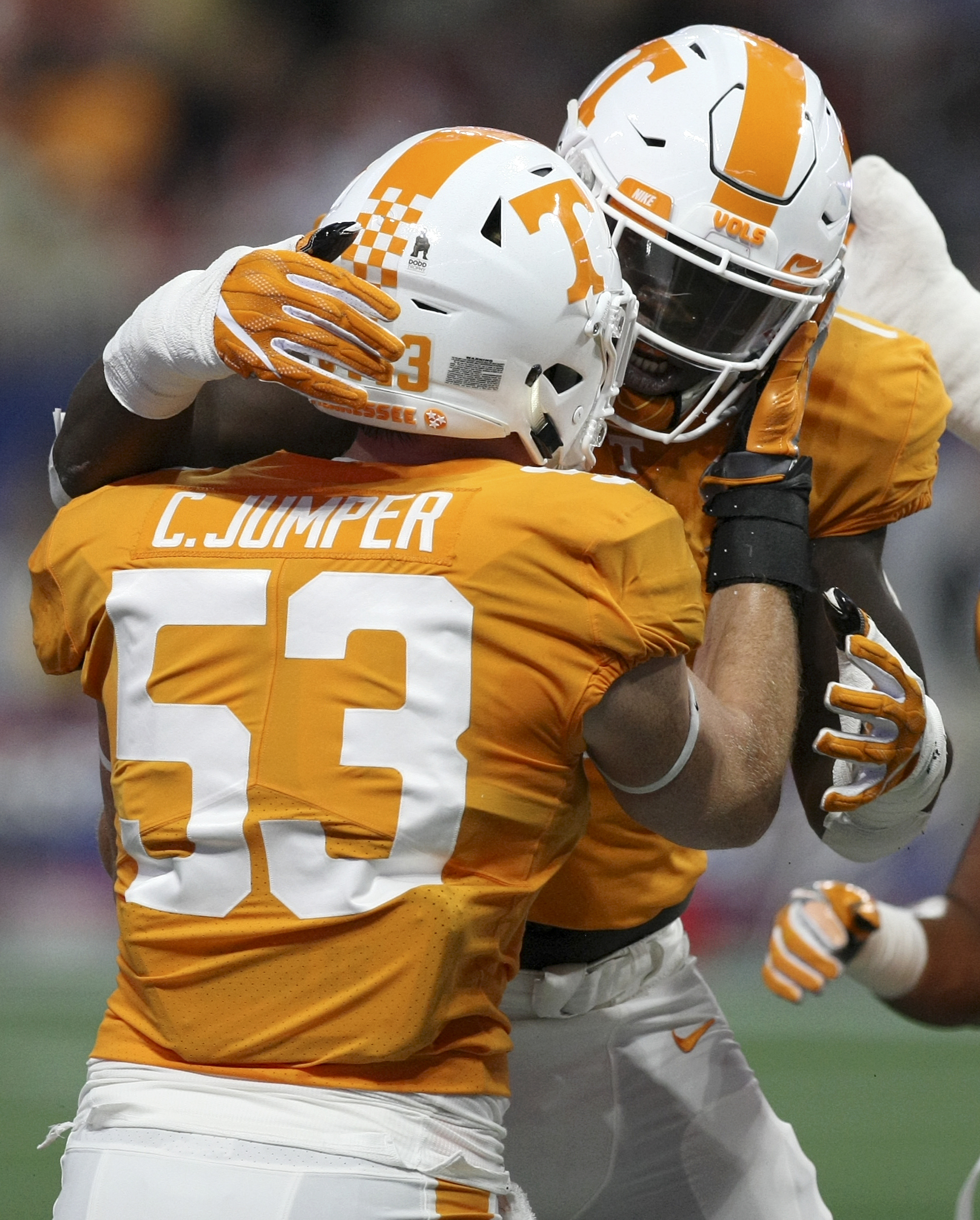 Tennessee defensive lineman Jonathan Kongbo (1) and linebacker Colton Jumper (53) celebrate a stop against Georgia Tech during the Chick-fil-A Kickoff Game at Mercedes-Benz Stadium on Monday, Sept. 4, in Atlanta, Ga.