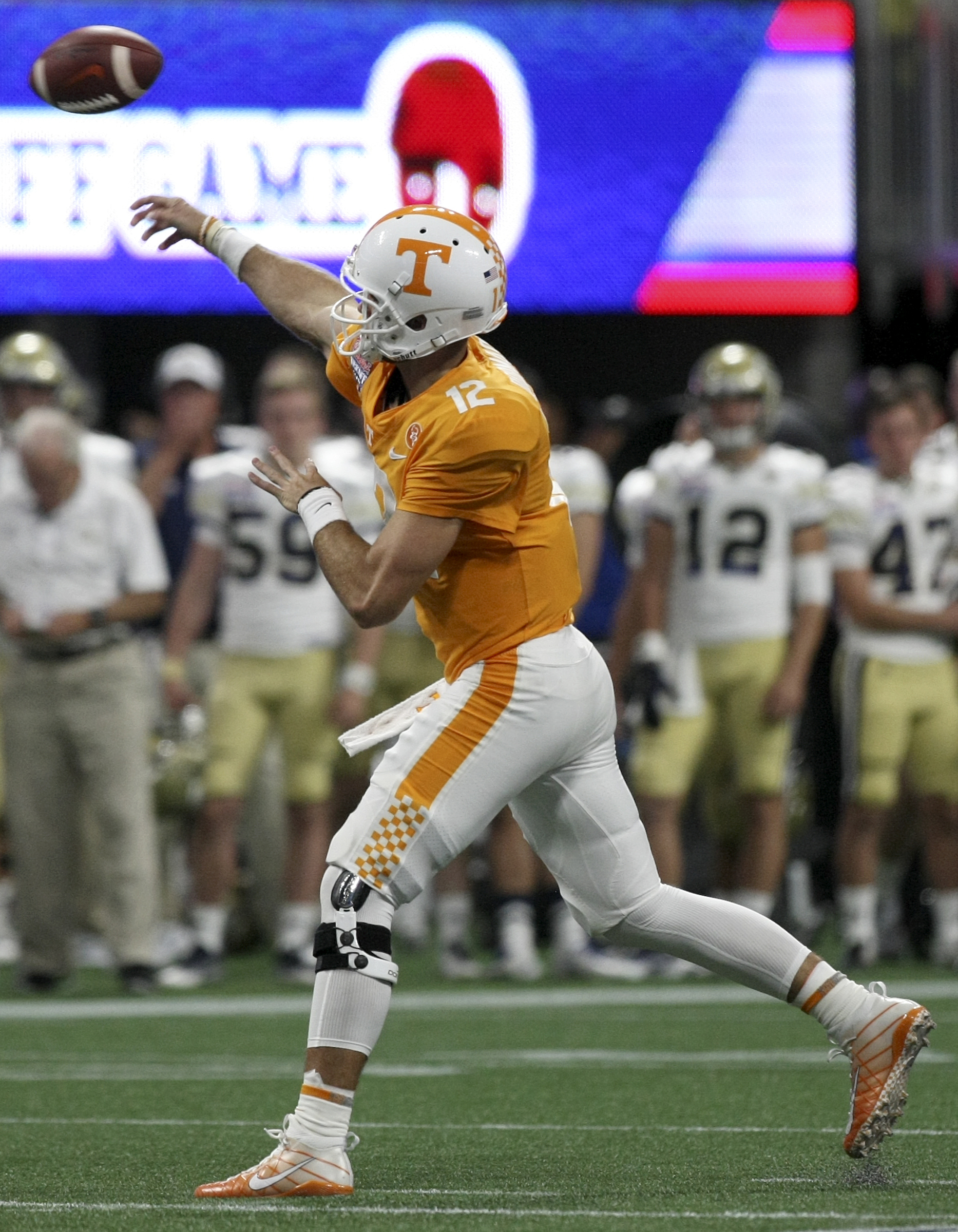 Tennessee quarterback Quinten Dormady (12) passes the ball against Georgia Tech during the Chick-fil-A Kickoff Game at Mercedes-Benz Stadium on Monday, Sept. 4, in Atlanta, Ga.