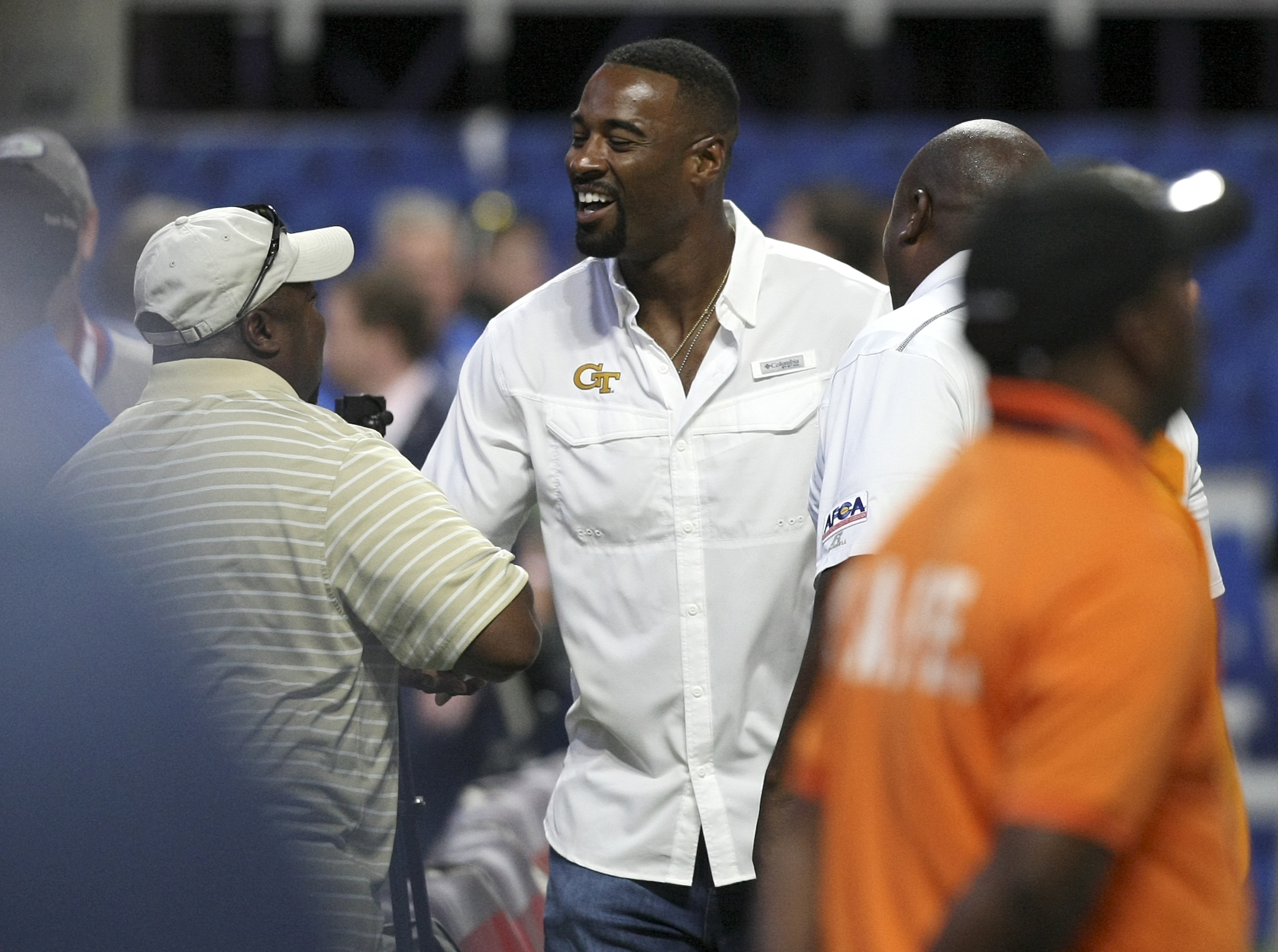Former Georgia Tech and Detroit Lions wide receiver Calvin Johnson is seen on the field prior to kickoff between Georgia Tech and Tennessee in the Chick-fil-A Kickoff Game at Mercedes-Benz Stadium on Monday, Sept. 4, in Atlanta, Ga.