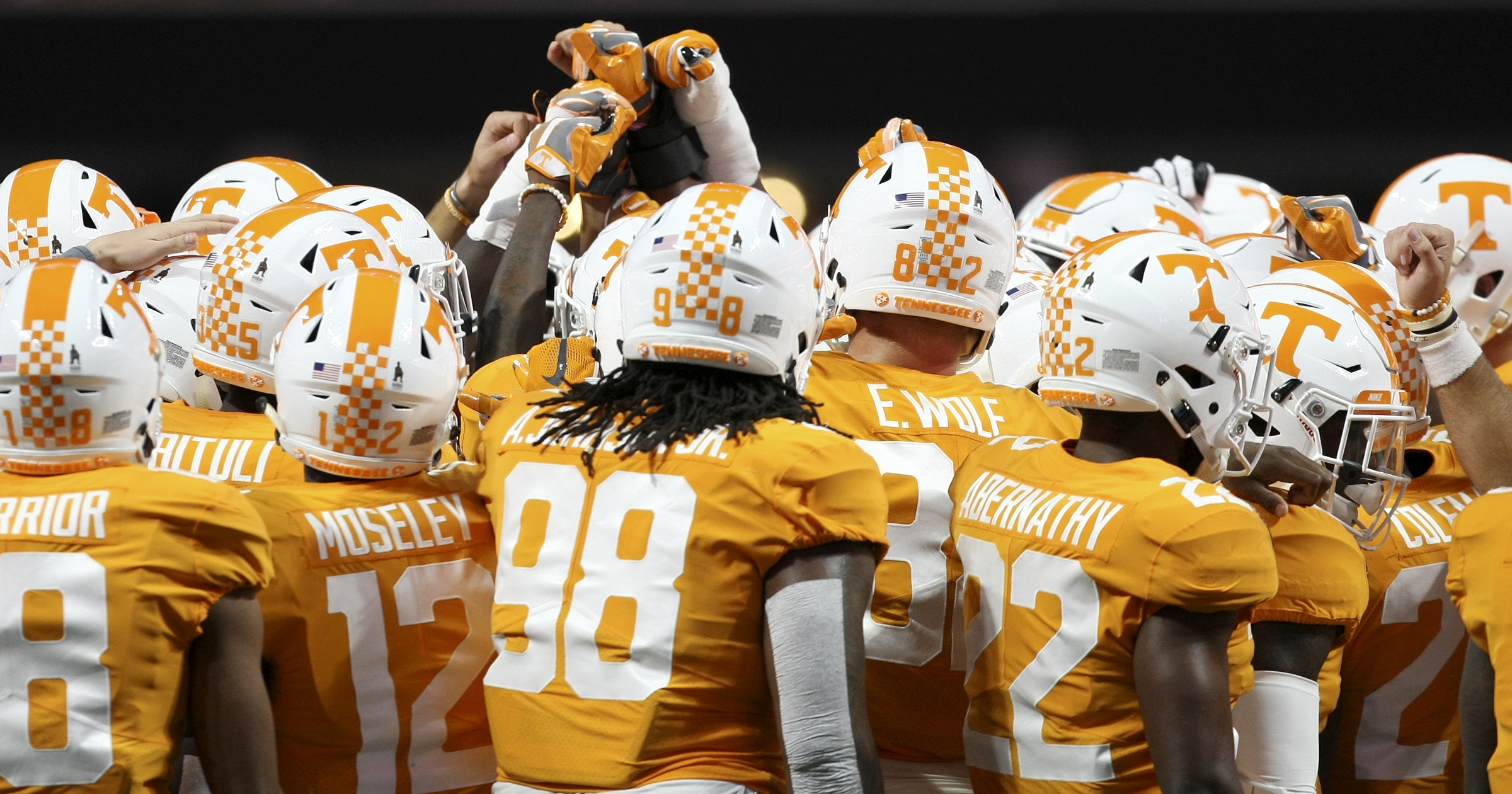 The Tennessee Volunteers huddle up during warmups before kickoff against Georgia Tech in the Chick-fil-A Kickoff Game at Mercedes-Benz Stadium on Monday, Sept. 4, in Atlanta, Ga.