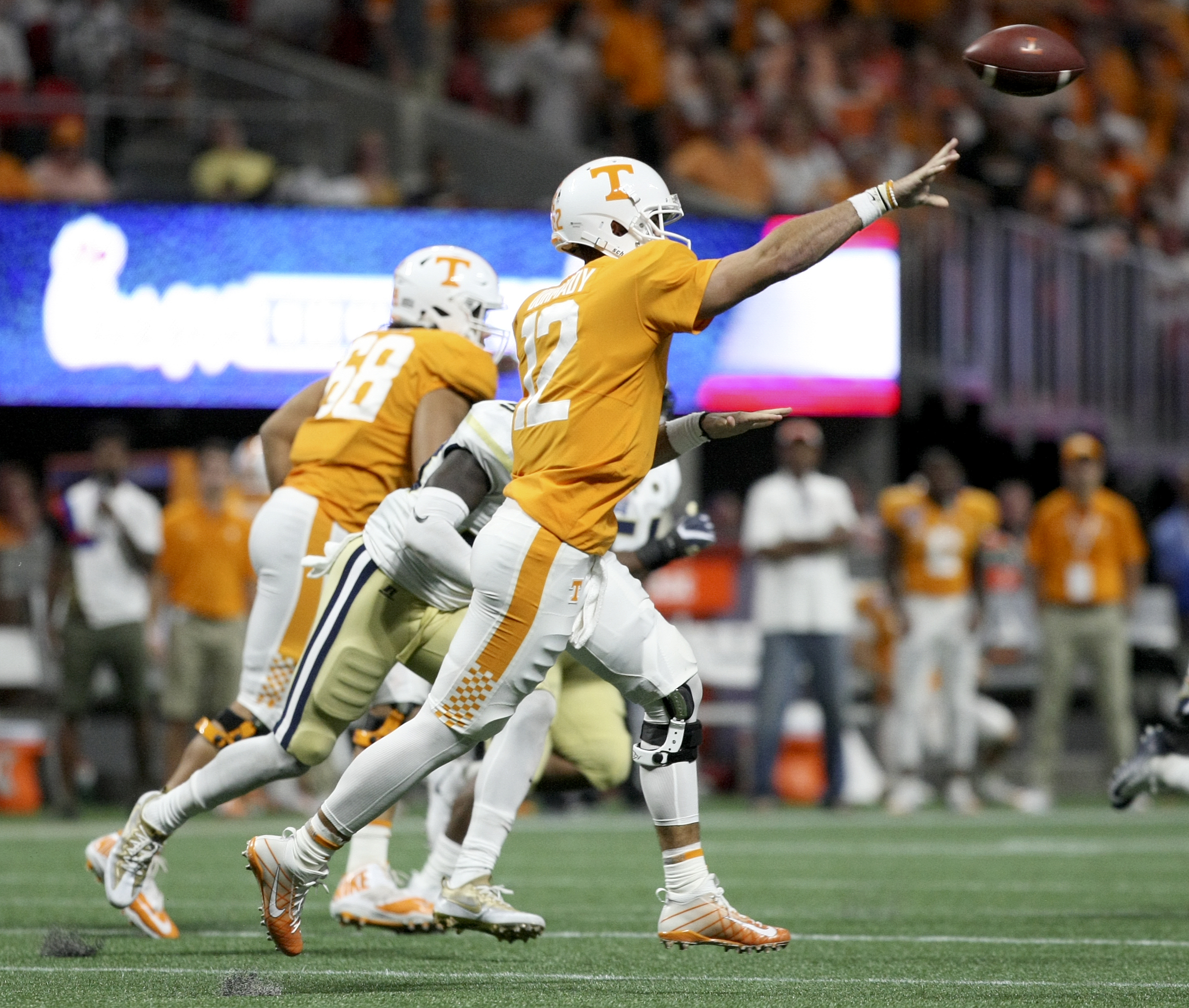 Tennessee quarterback Quinten Dormady (12) passes the ball against Georgia Tech during the Chick-fil-A Kickoff Game at Mercedes-Benz Stadium on Monday, Sept. 4, in Atlanta, Ga.