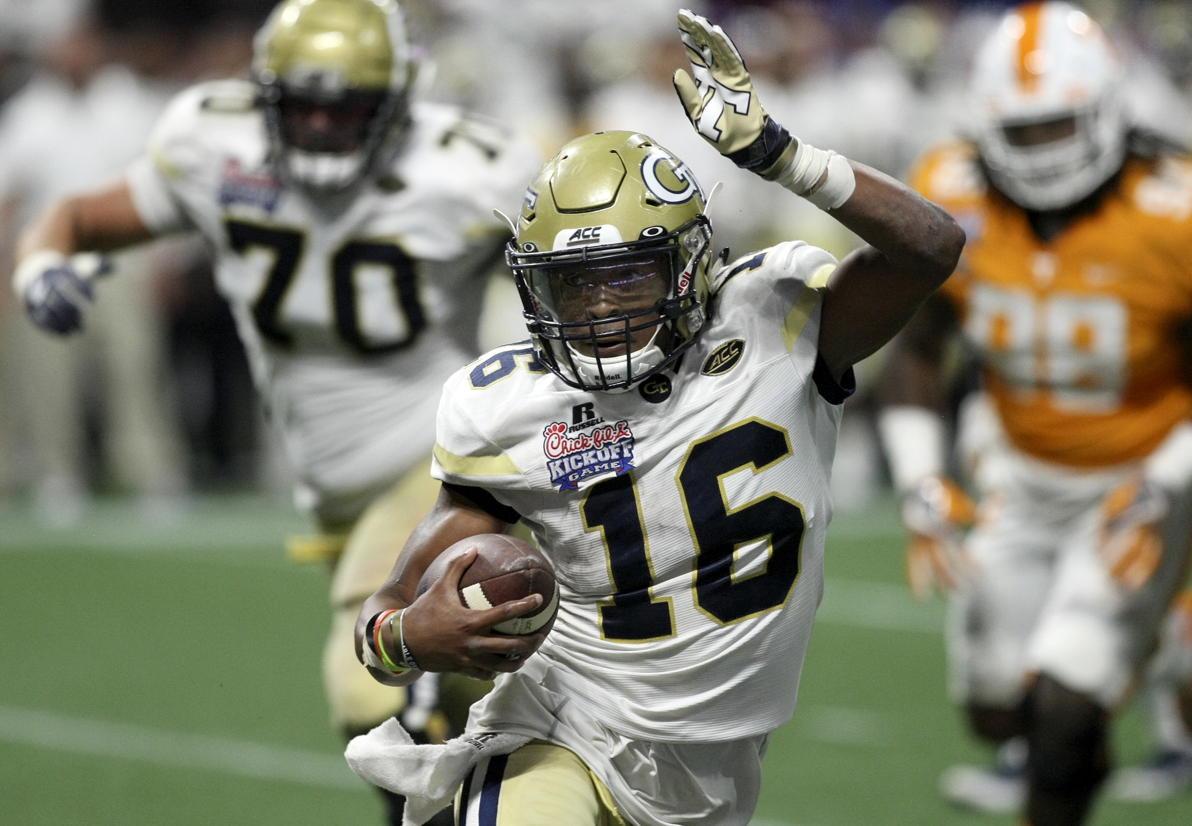 Georgia Tech quarterback TaQuon Marshall (16) scrambles against Tennessee during the Chick-fil-A Kickoff Game at Mercedes-Benz Stadium on Monday, Sept. 4, in Atlanta, Ga.