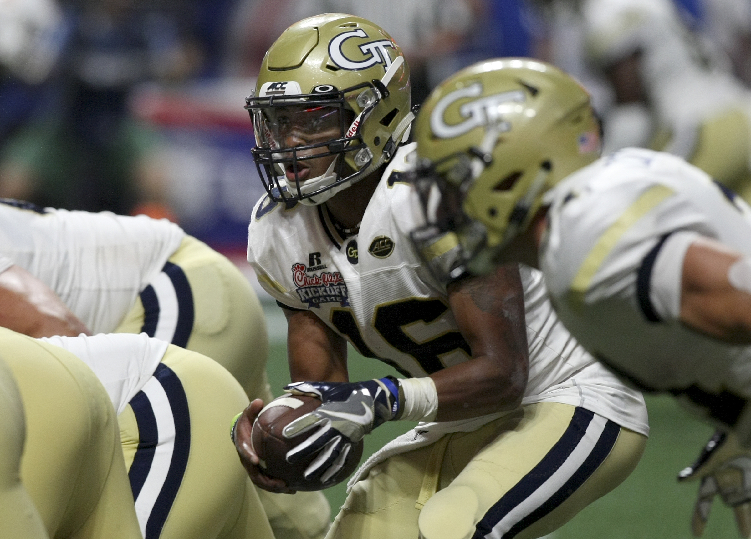Georgia Tech quarterback TaQuon Marshall (16) takes the snap near the goal line against Tennessee during the Chick-fil-A Kickoff Game at Mercedes-Benz Stadium on Monday, Sept. 4, in Atlanta, Ga.